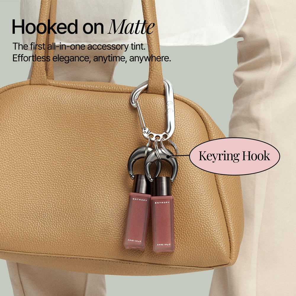 Entropy Charm Tint Blurry Line keychain-cap design supports on-the-go lipstick touchups.