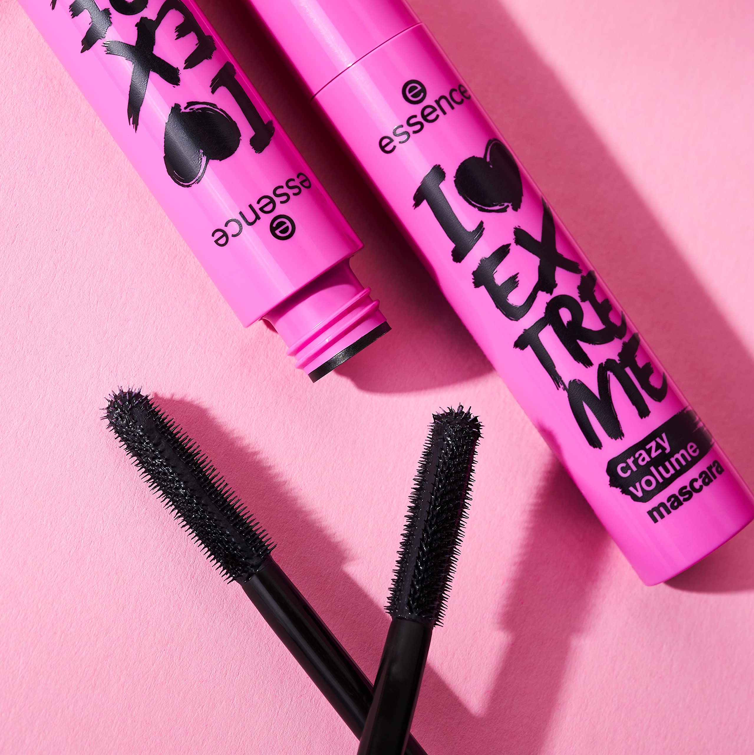 essence I Love Extreme Crazy Volume Mascara bottle closeup emphasizes sleek design and bold payoff.