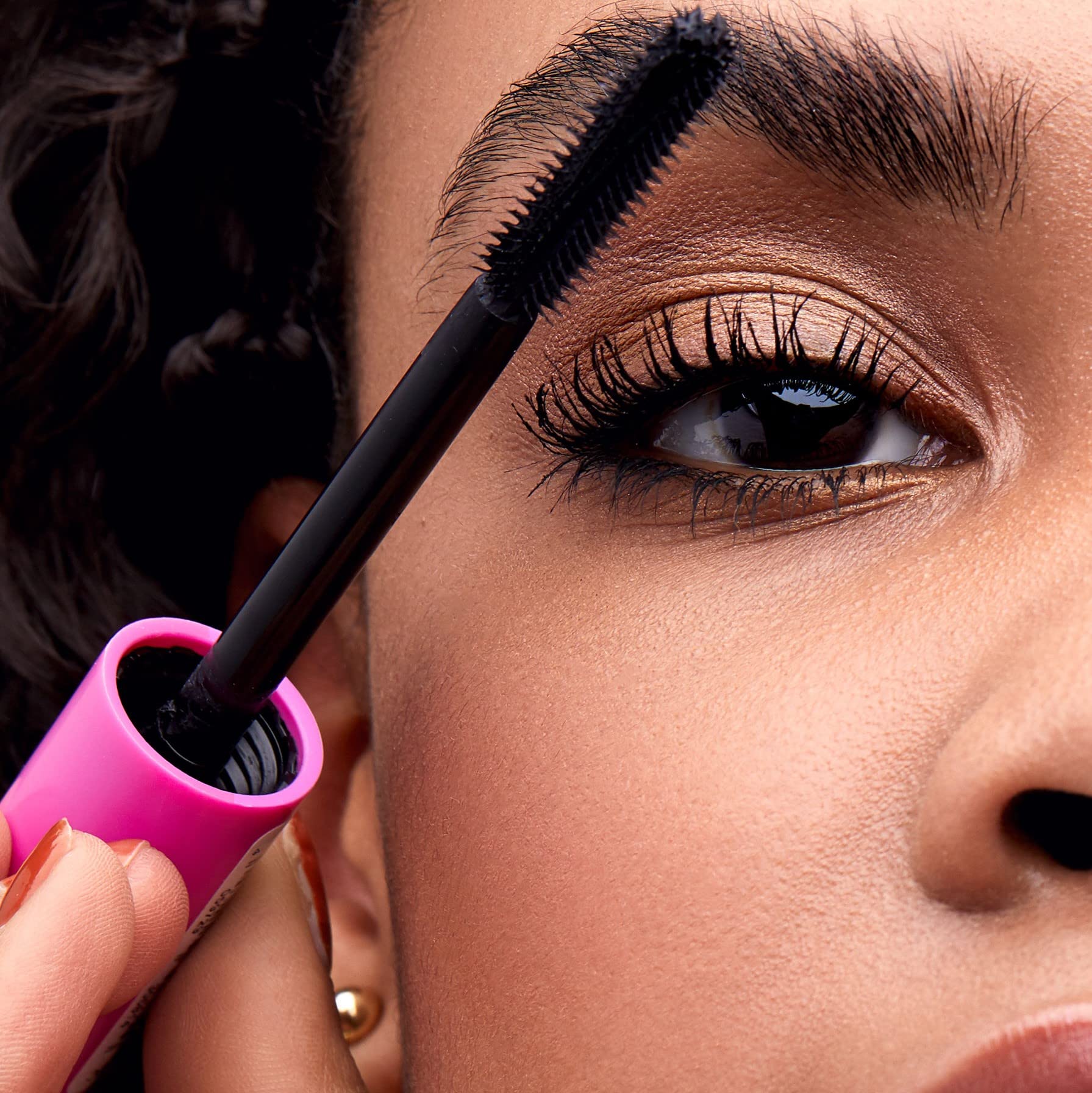 essence I Love Extreme Crazy Volume Mascara multiple coats on lashes for bold, statement volume.