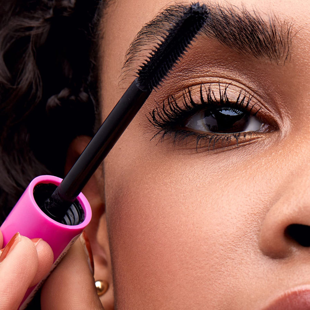 essence I Love Extreme Crazy Volume Mascara multiple coats on lashes for bold, statement volume.