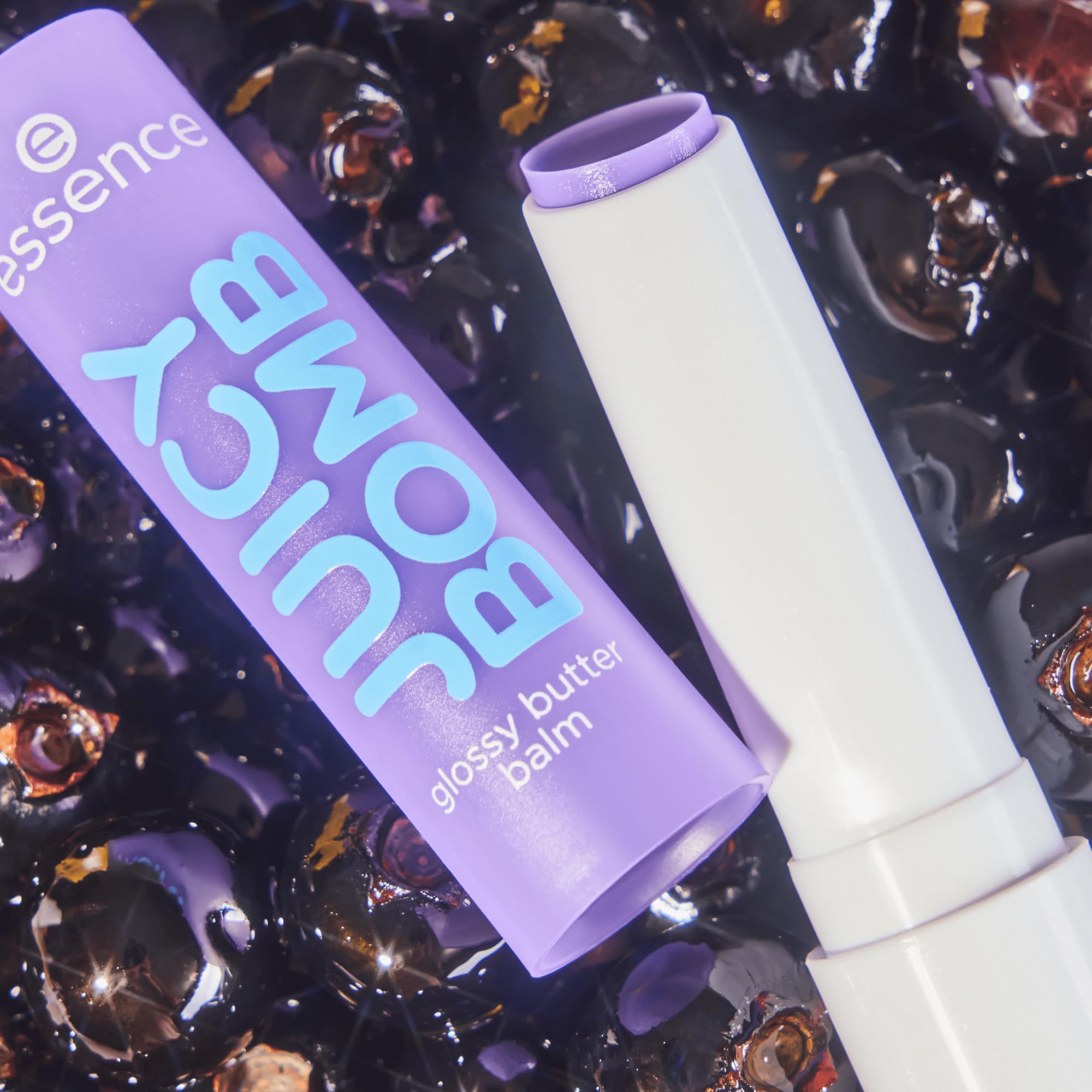 essence Juicy Butter Balm Choco-lot to Handle swatch on lips with cocoa brown depth