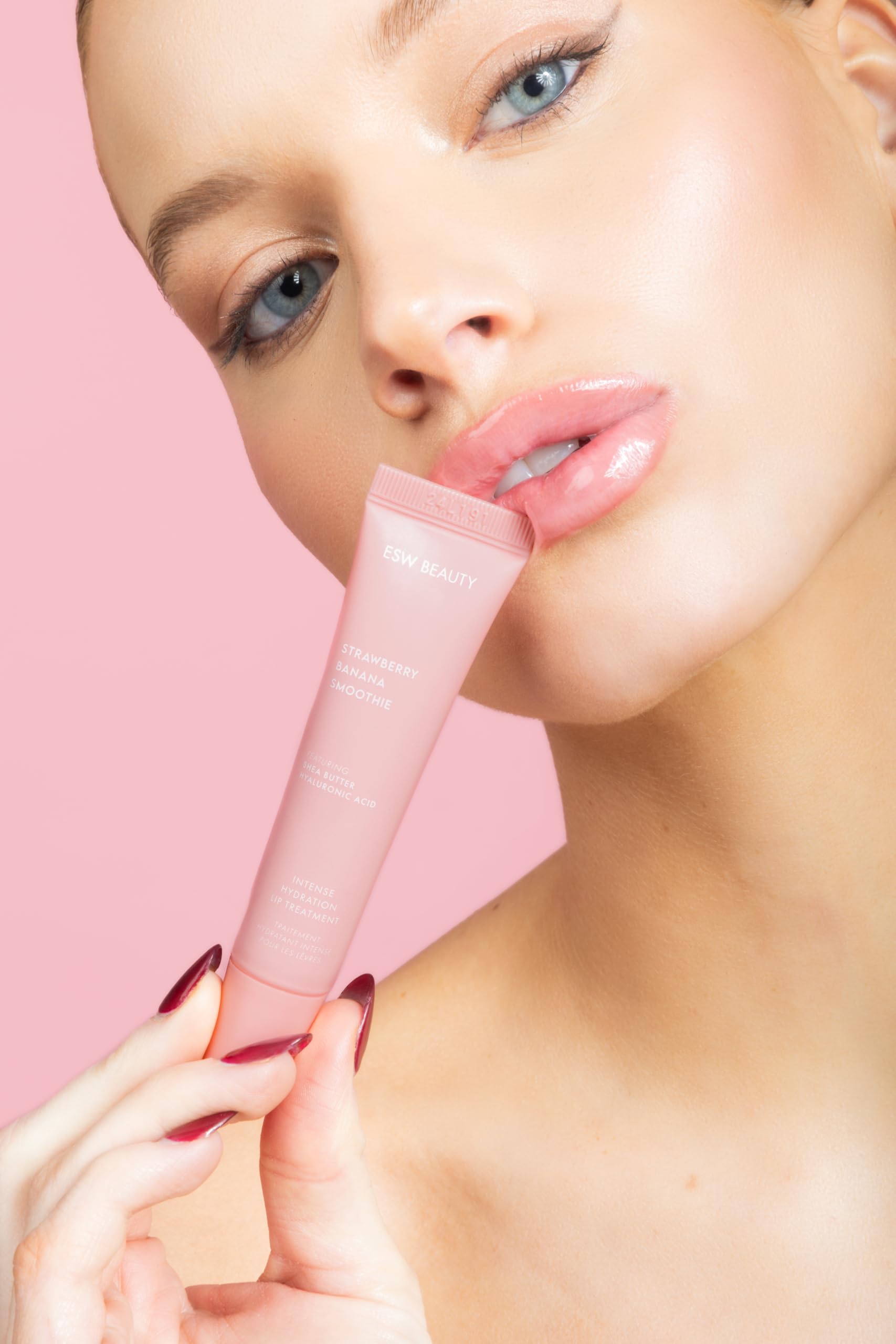 ESW Beauty packaging display photo highlights travel-friendly lip treatment for on-the-go moisture.