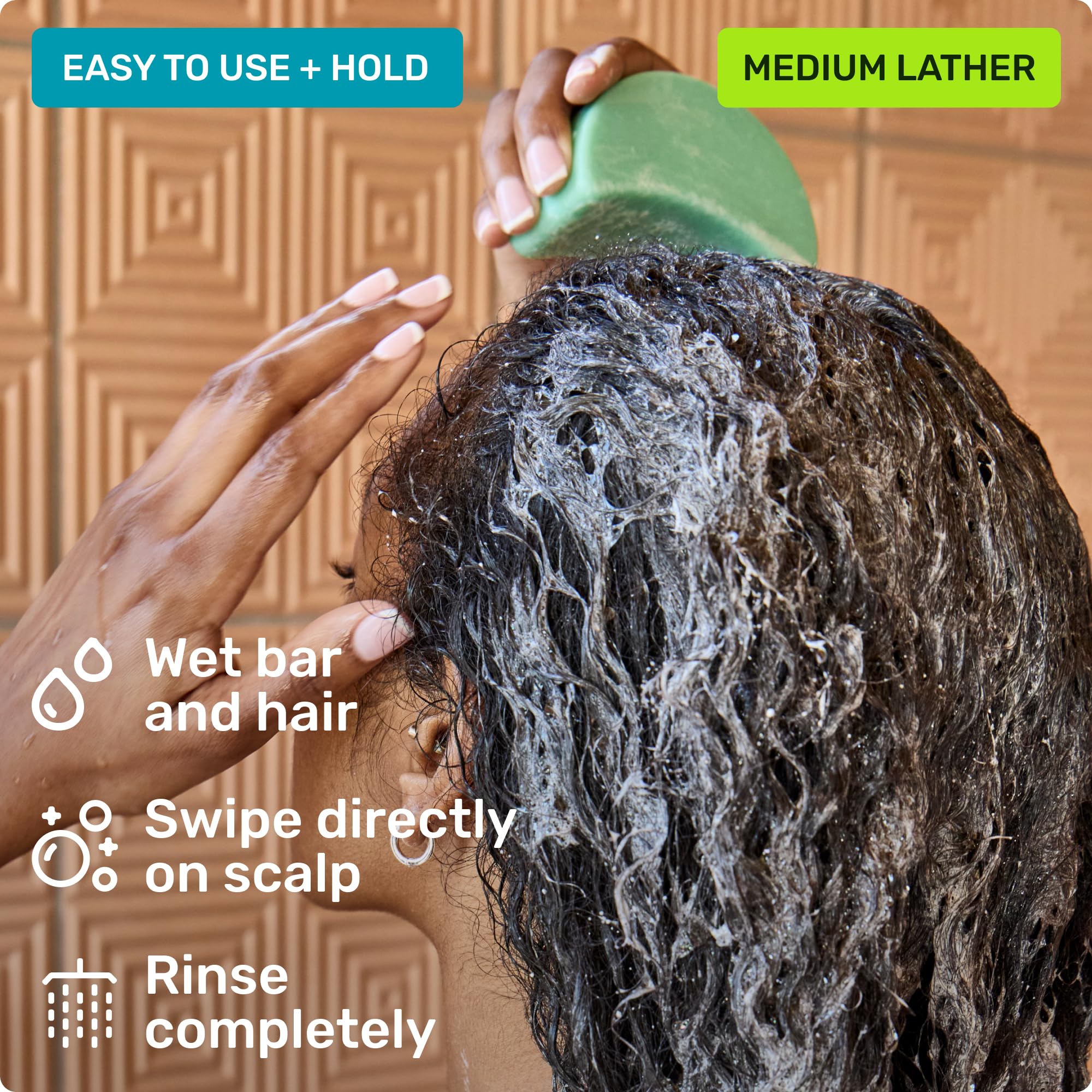 Ethique frizz-control and shine bar image with glossy strands.