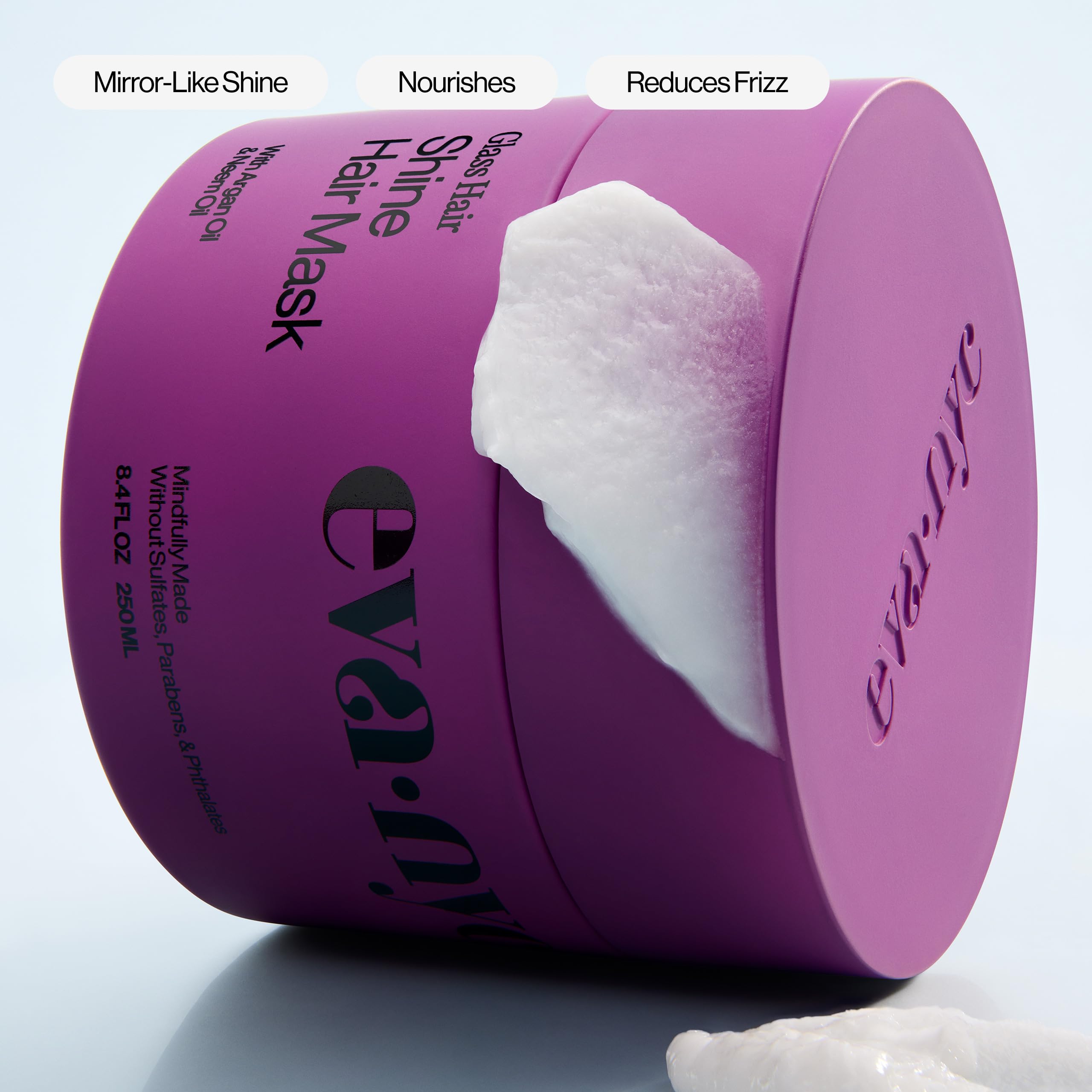 EVA NYC anti-frizz mask warm vanilla scent shown during product use.