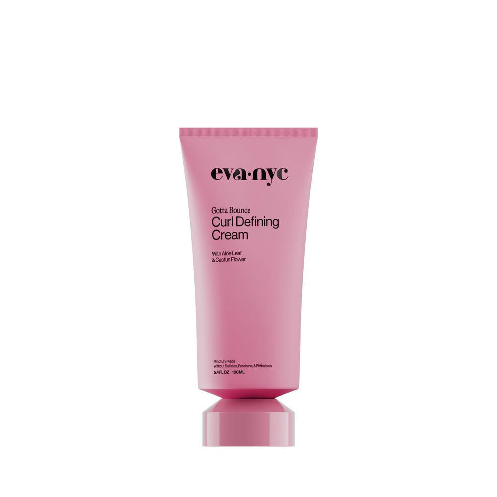 Eva NYC curl-enhancing styling cream bottle demonstrates frizz control and defined curls.