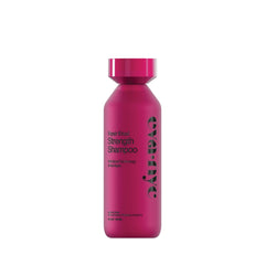 Eva NYC Ritual Repair Shampoo bottle demonstrates bond-strengthening care for hair