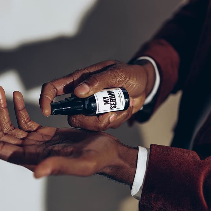 Evan Alexander Fine Grooming MY Serum Beard Oil applied for lasting hydration.