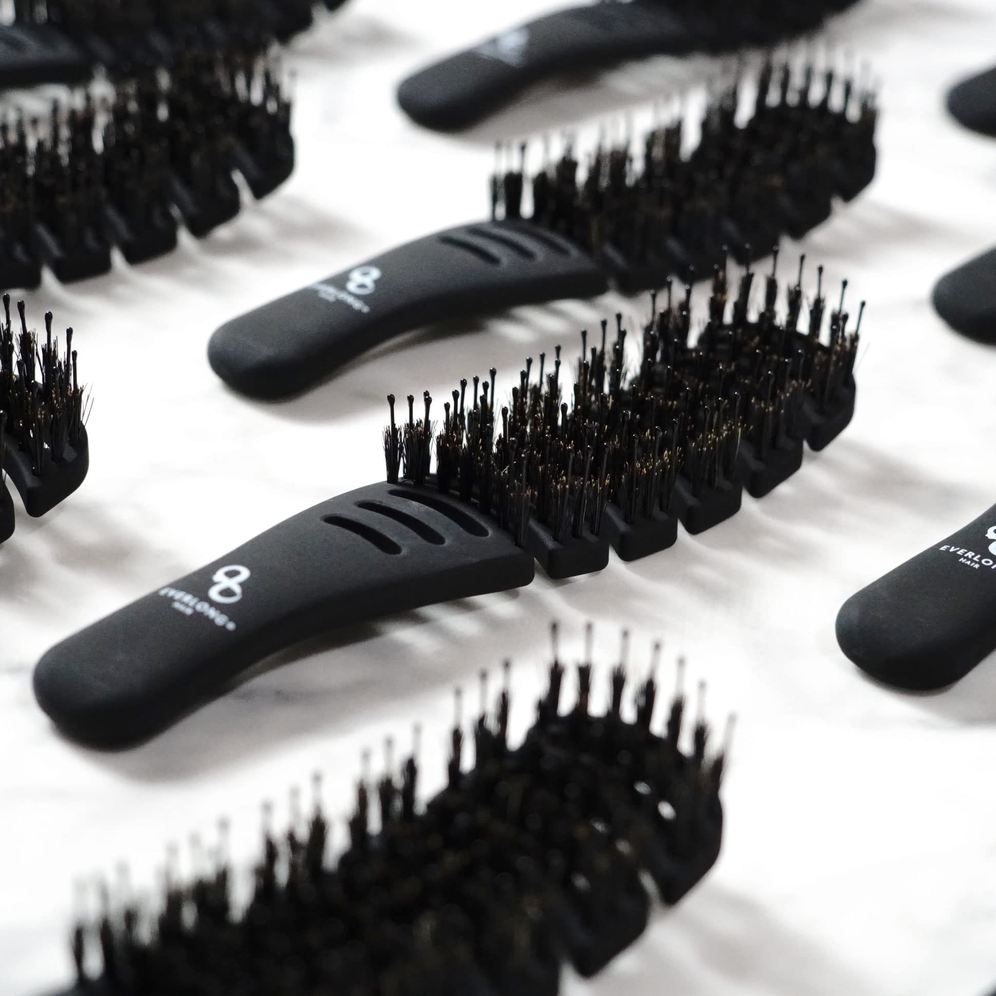 Everlong Flex Boar Bristle Brush ergonomic handle provides precise brushing.