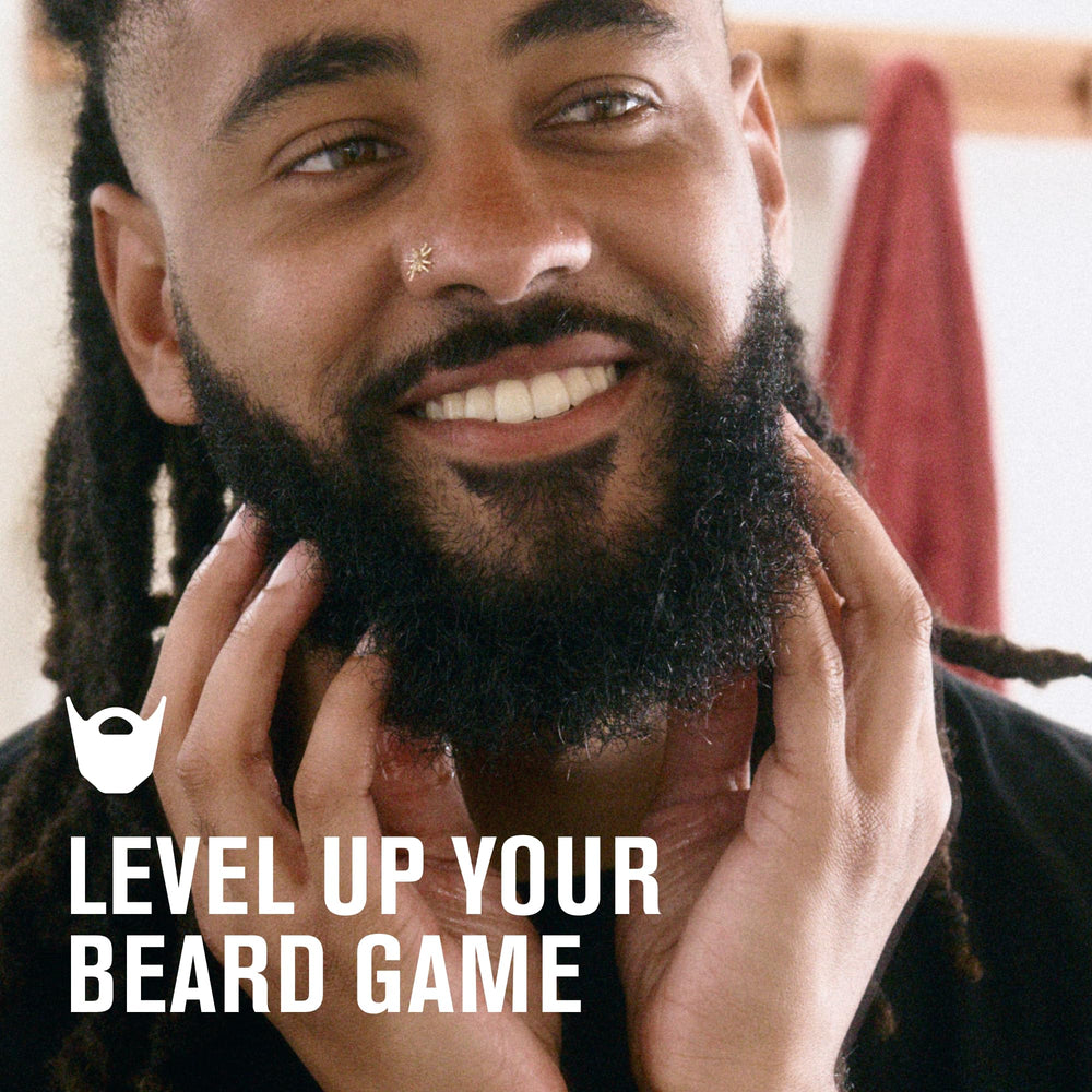 Every Man Jack beard butter jar application smooths frizz and flyaways for silky beard.