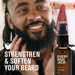 Every Man Jack sandalwood beard oil dropper closeup highlights rich oils for itch relief.