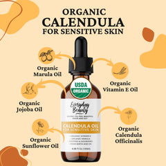 Everyday Beauty calendula oil amber bottle label highlights unscented, plant-based formula for all skin types.