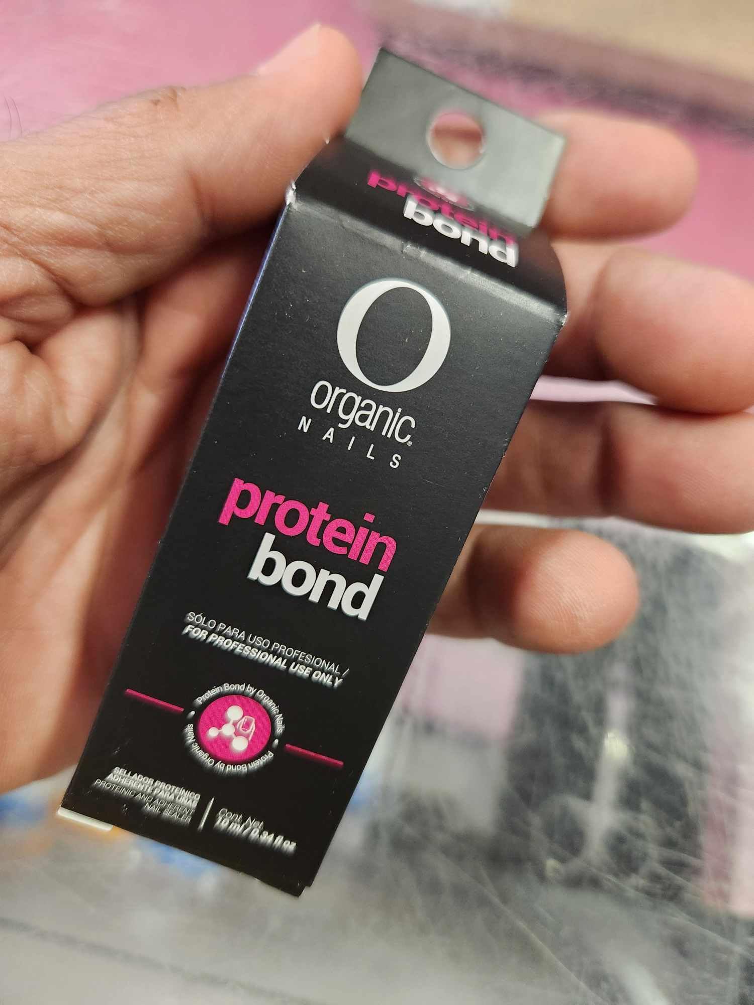 Extravaganza Nails protein bond primer 10ml brush-dispense shows smooth, even coating.
