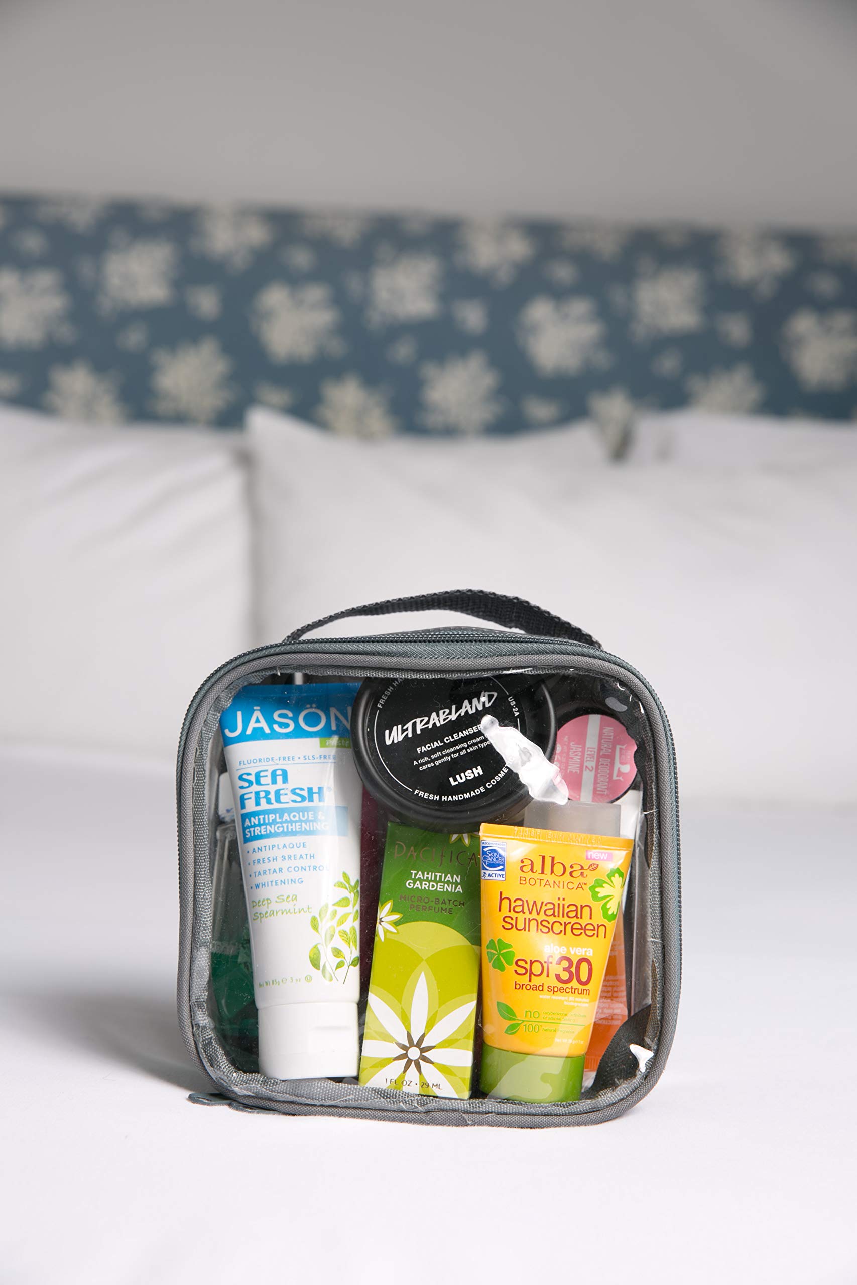 EzPacking clear TSA bag zipper showing easy access for toiletries on the go.