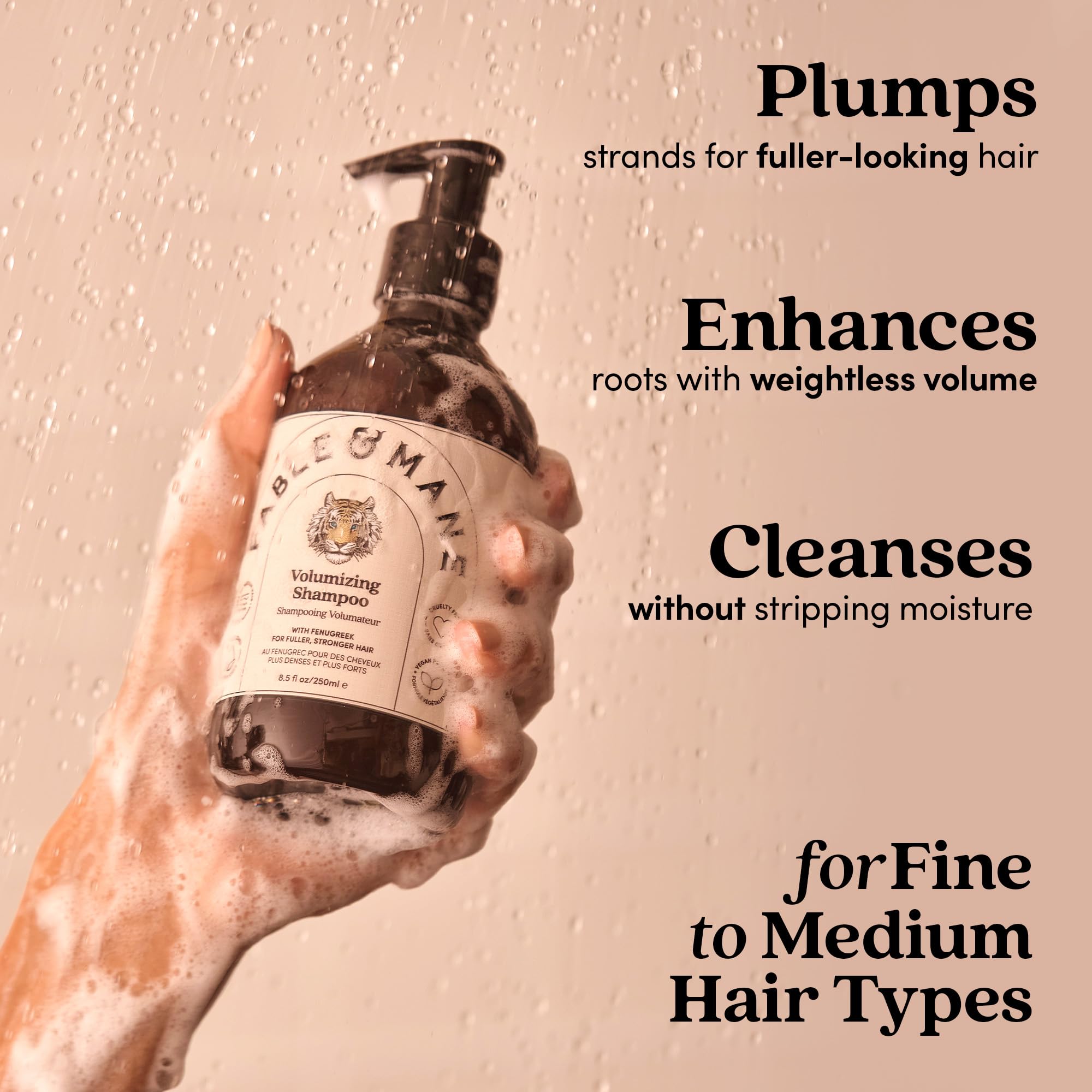 Close-up of Fable & Mane Volumizing Shampoo applied to hair for shine-boosting results.