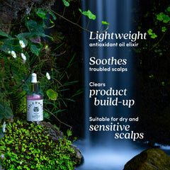 Fable & Mane amla serum dropper ready for targeted scalp soothing application
