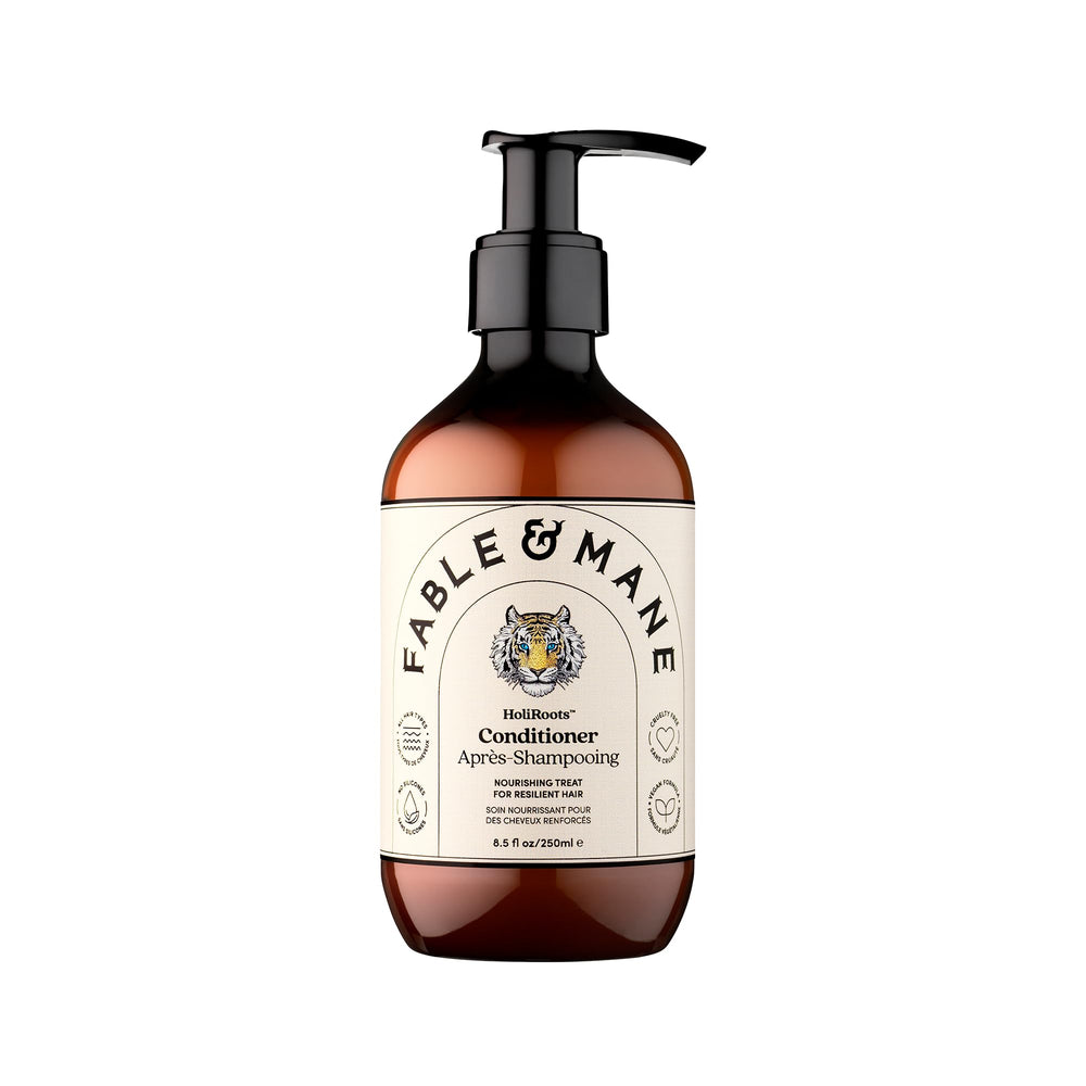 Fable & Mane Hydrating Conditioner bottle on sink provides daily moisture for dry hair.