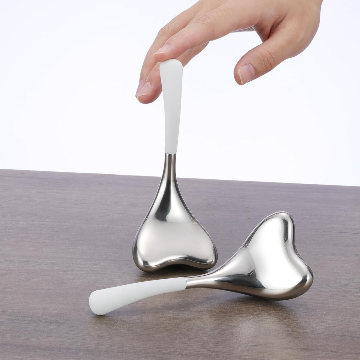 Fabludo 2-in-1 Gua Sha Cryo Sticks mermaid-tail design cools and contours facial skin.