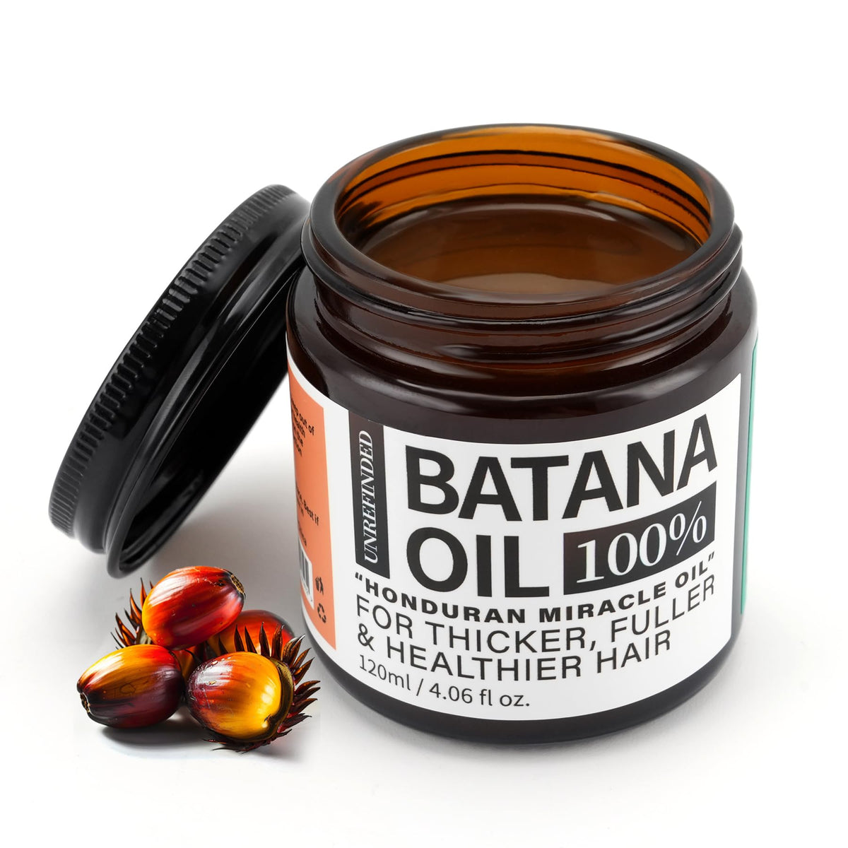 Fadelo Batana Oil bottle close-up showing rich, nourishing formula for hair hydration.