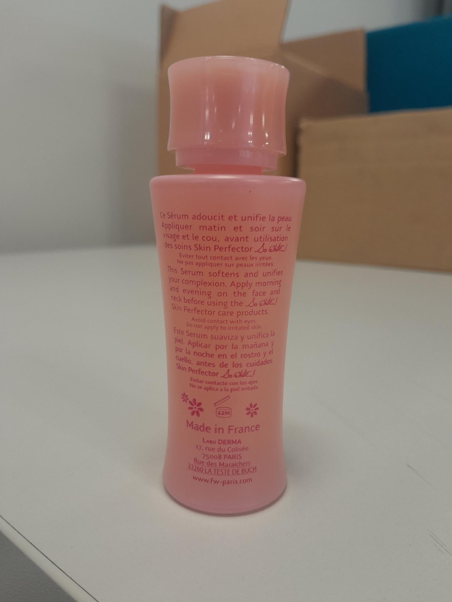 FAIR & WHITE So White serum pump close-up showing quick-penetration texture