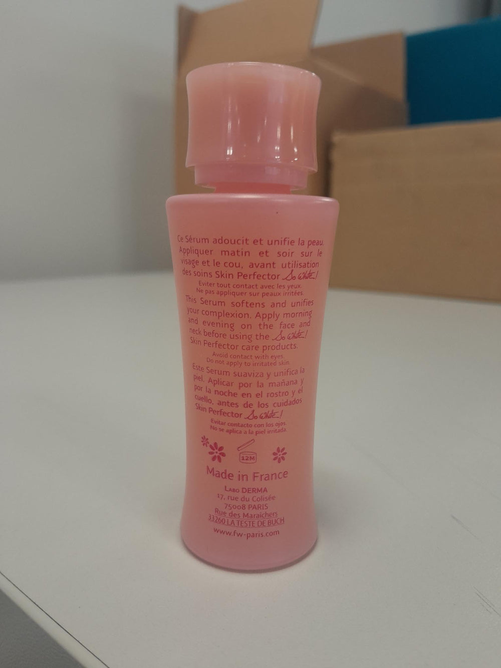 FAIR & WHITE So White serum pump close-up showing quick-penetration texture