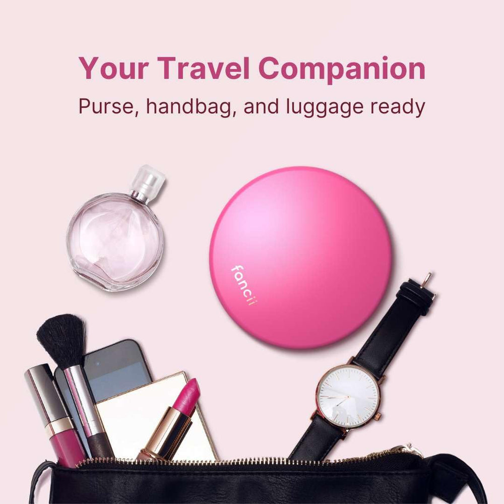 Fancii Taylor compact travel mirror in handbag for on-the-go touch-ups.