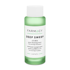 Farmacy 2% Salicylic Acid Toner bottle on a bathroom shelf for clear pores.