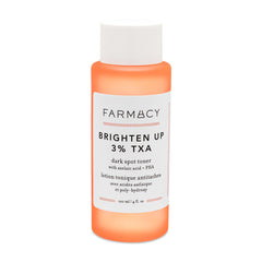 Farmacy 3% TXA Toner bottle closeup showing brightening and tone-evening benefits
