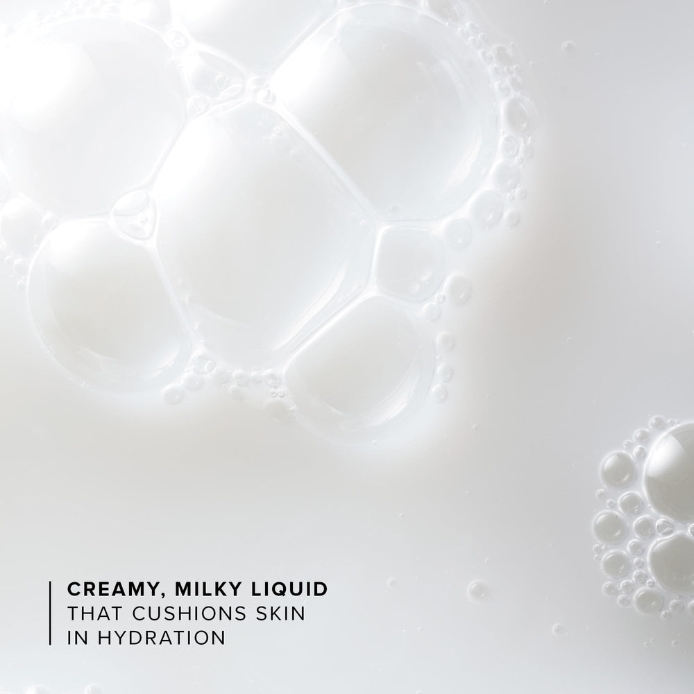 Farmacy Hydrating Essence being pressed onto skin shows glow-ready prep.