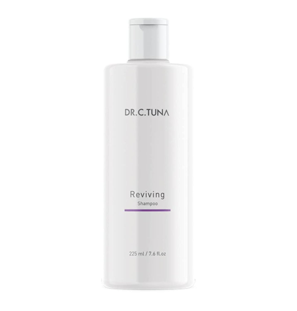 FARMASi Dr. C. Tuna Reviving Shampoo bottle pour showing volumizing formula for fuller hair
