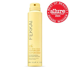 Fekkai Full Blown Volume Texturizer spray application showing texture and lift