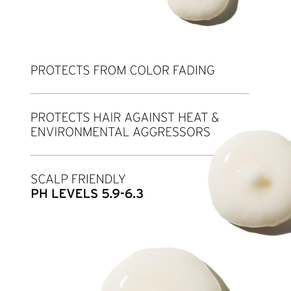 Fekkai Technician Color Conditioner foamy lather in palm ready to apply.