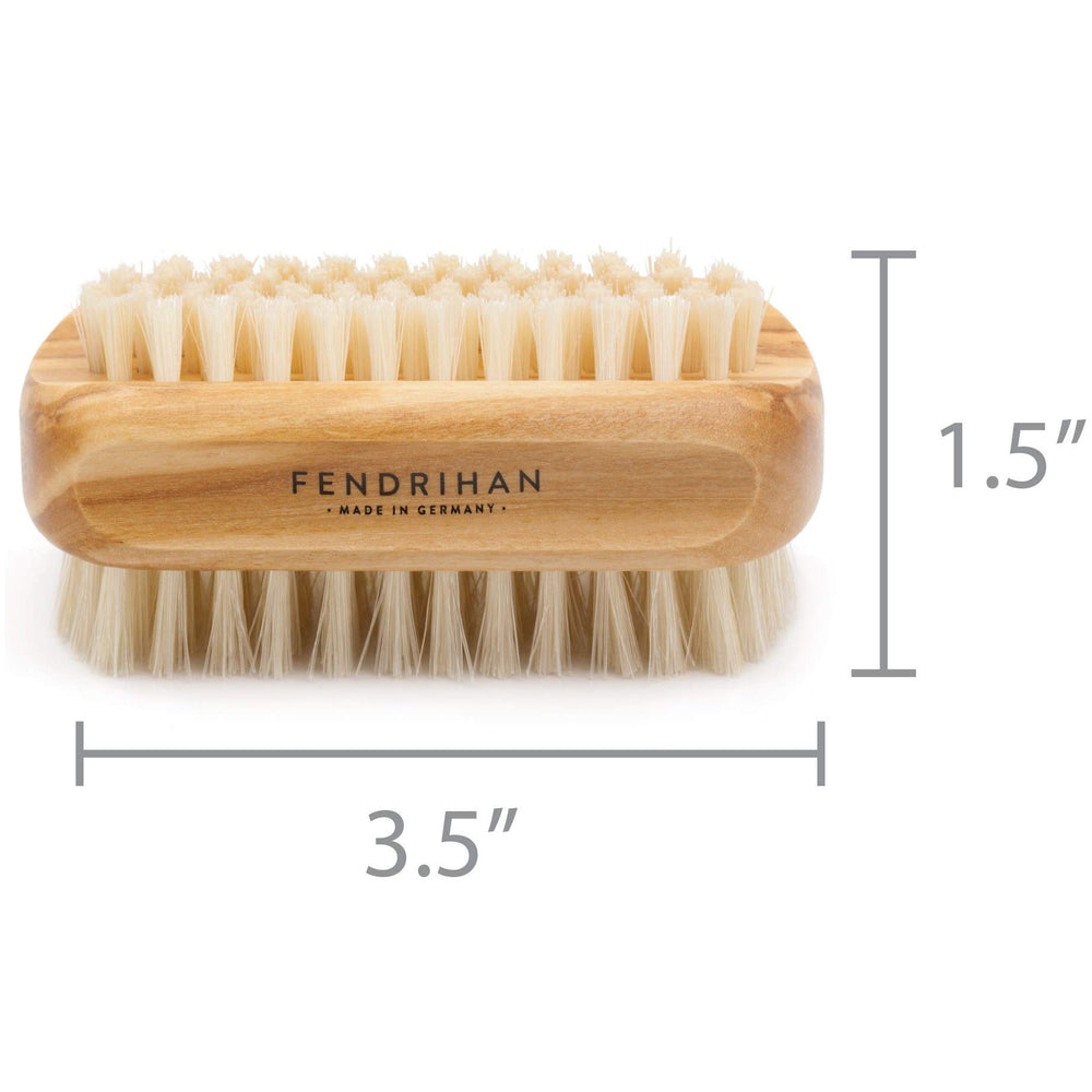 Fendrihan nail brush in use on fingernails for thorough scrubbing.