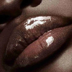 FENTY BEAUTY Gloss Bomb 01 tube application shows smooth non-sticky glide for quick touch-ups
