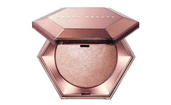 Fenty Diamond Bomb blends weightlessly for seamless body or face glow.
