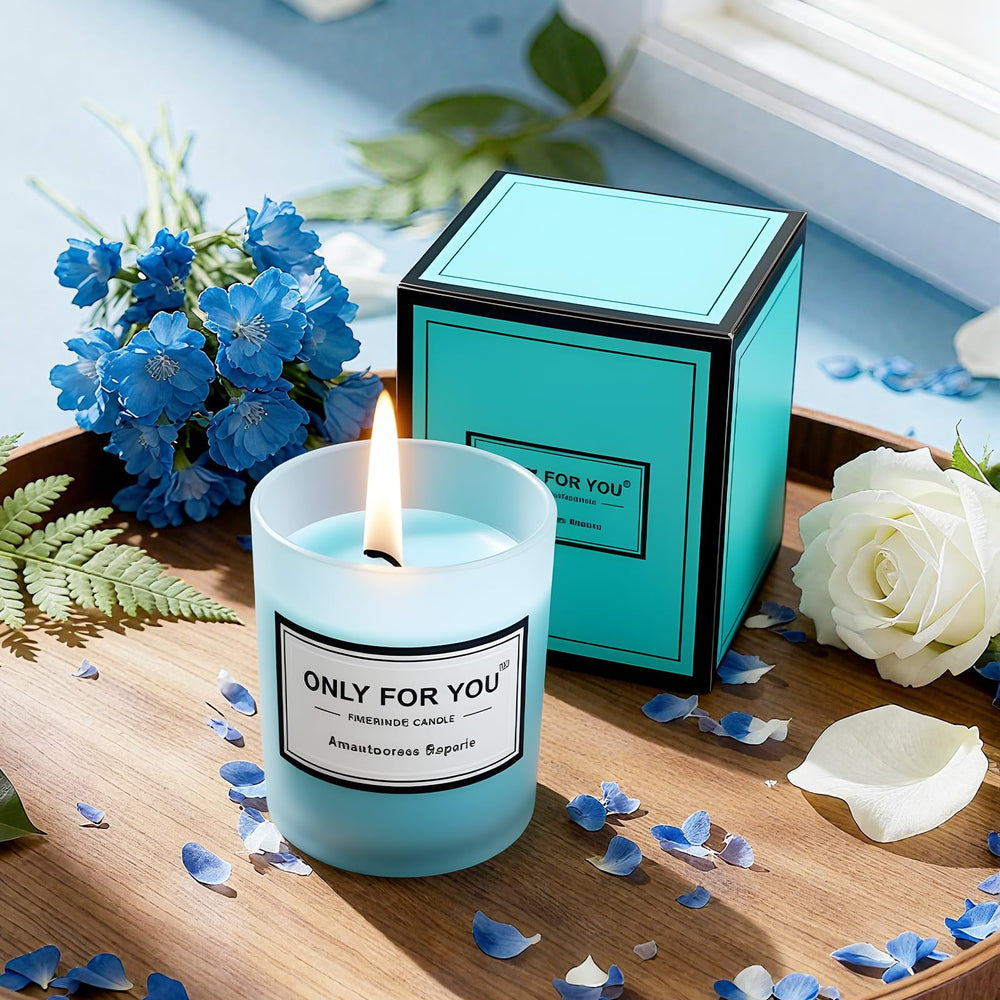 Ferdiiz Scented candle—soft glow to create a relaxing evening ambiance.