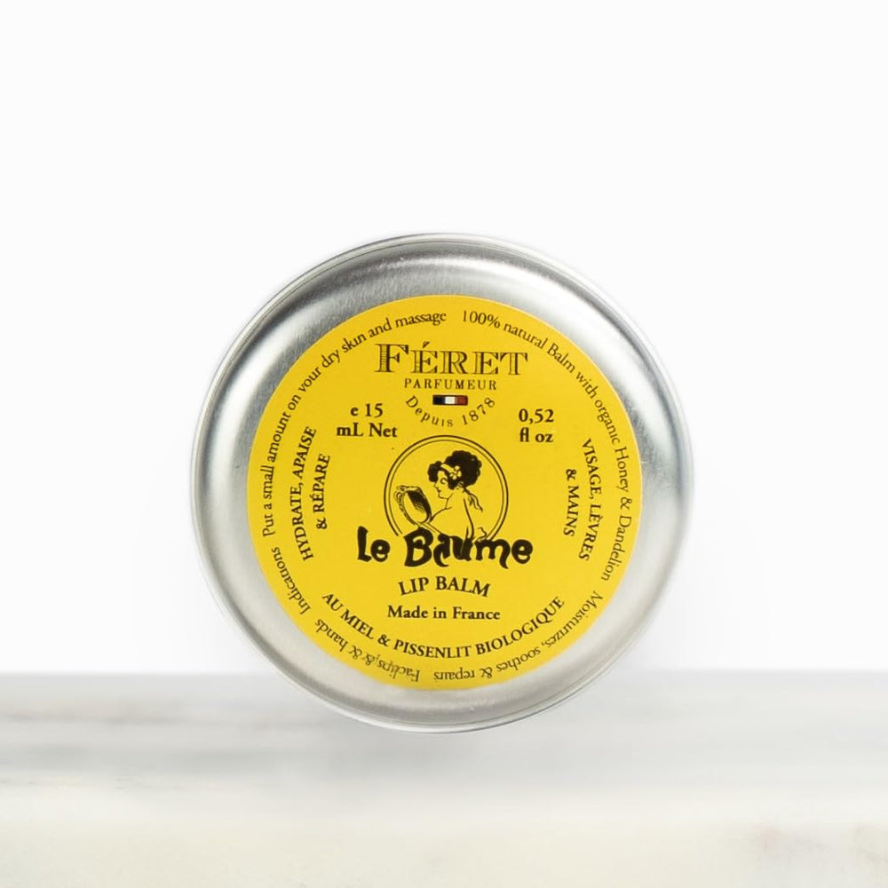 Feret Le Baume Rose Poudré applied to lips provides deep hydration with subtle rose glow.