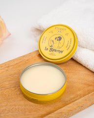 Feret Parfumeur Le Baume Rose Poudre applied to lips for hydration