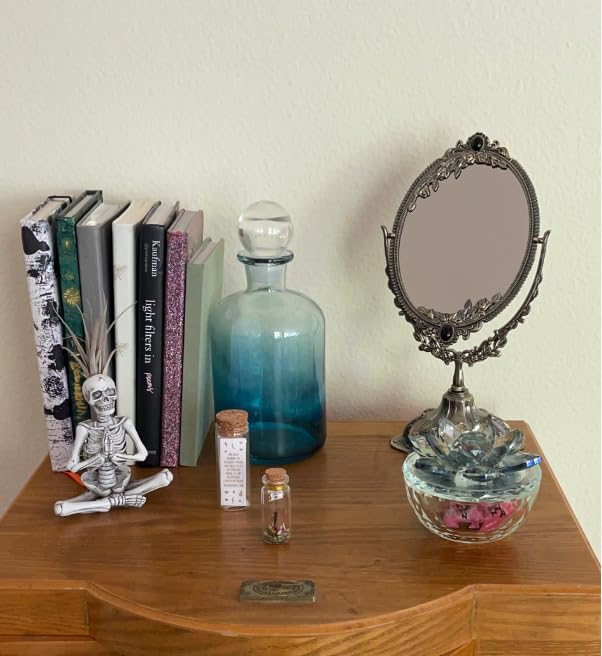 Feyarl mirror on stand at 11.2-inch height for comfortable viewing.