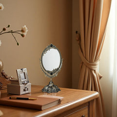 Feyarl vintage two-sided swivel mirror for versatile styling angles.
