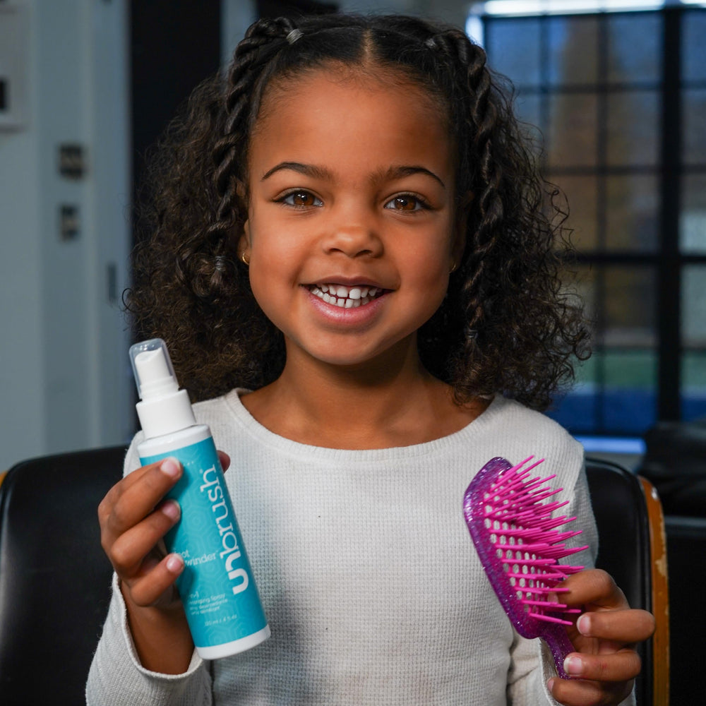 FHI Heat UNbrush detangler in action during styling session.