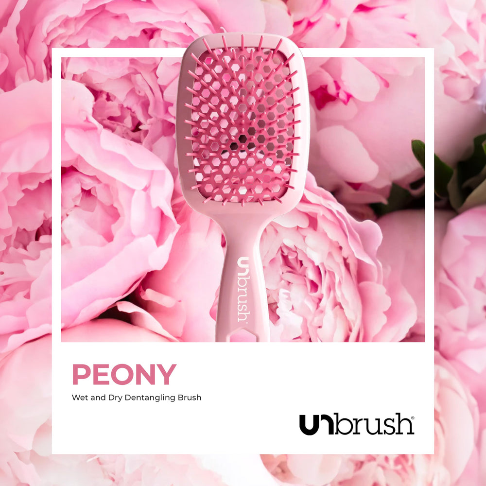 FHI Heat UNbrush dual-length bristles tackle knots for smooth, shiny results.
