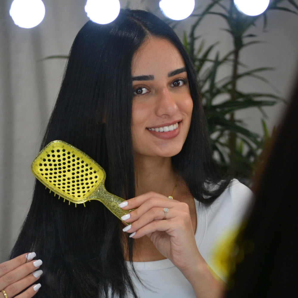 FHI Heat UNbrush detangling action on dry hair for smooth results.