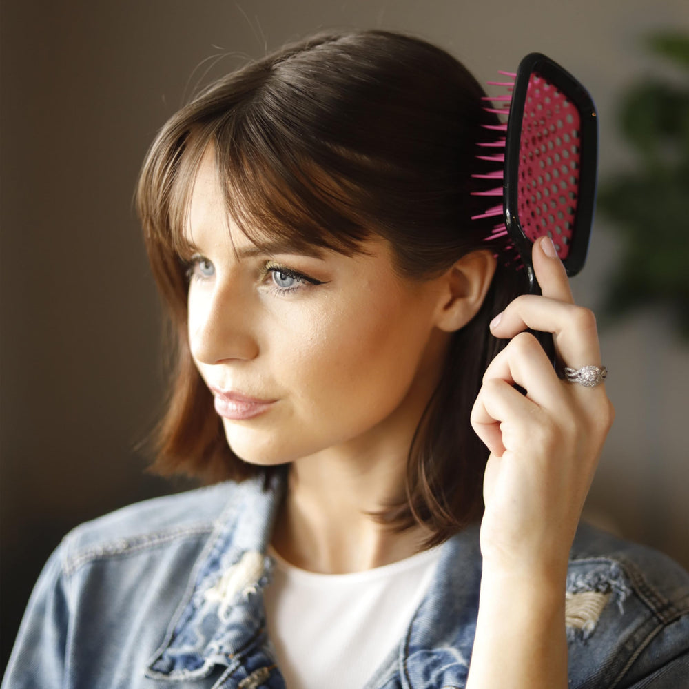 FHI Heat UNbrush lightweight handle held in hand for comfortable styling