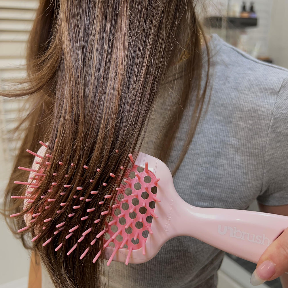 FHI Heat UNbrush lightweight handle enhances comfortable styling and control.