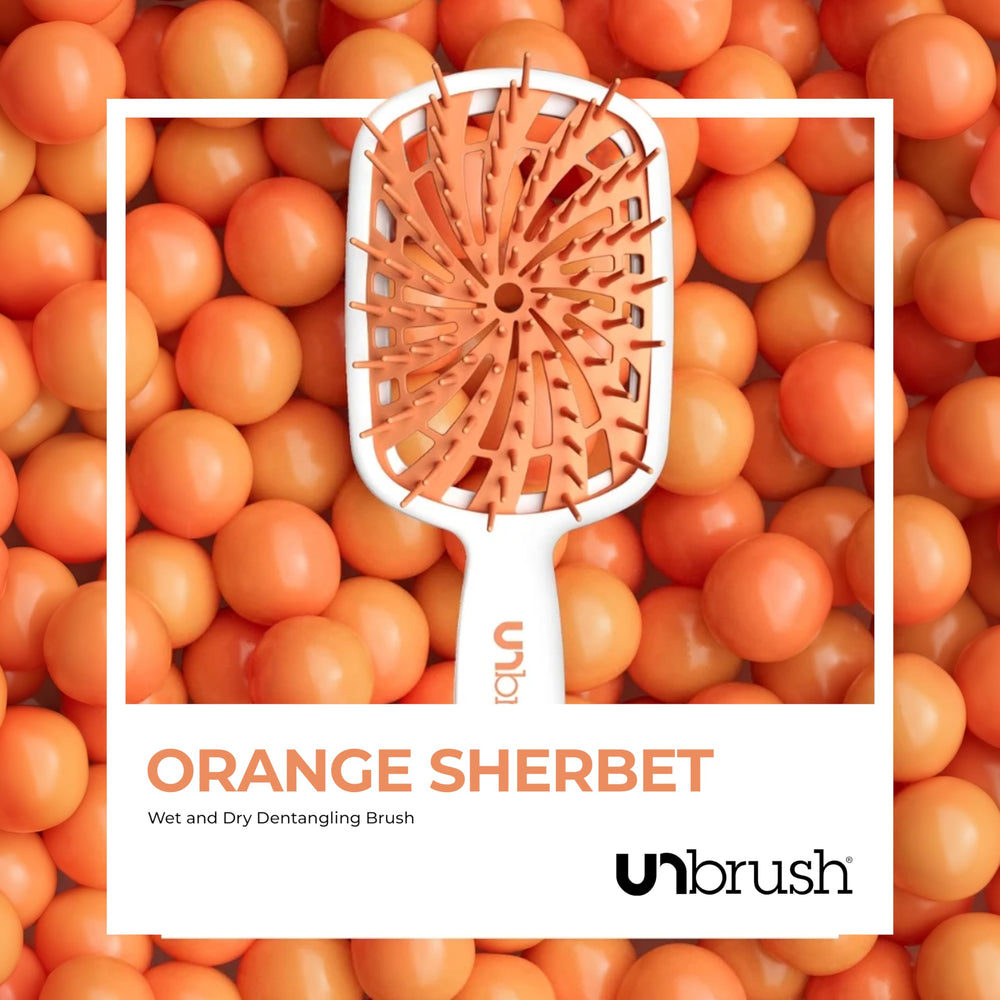 FHI Heat UNbrush Plus curly hair detangling in gentle motion on textured curls