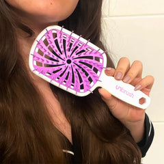 FHI Heat UNbrush Plus used on wet hair to minimize pull and snagging
