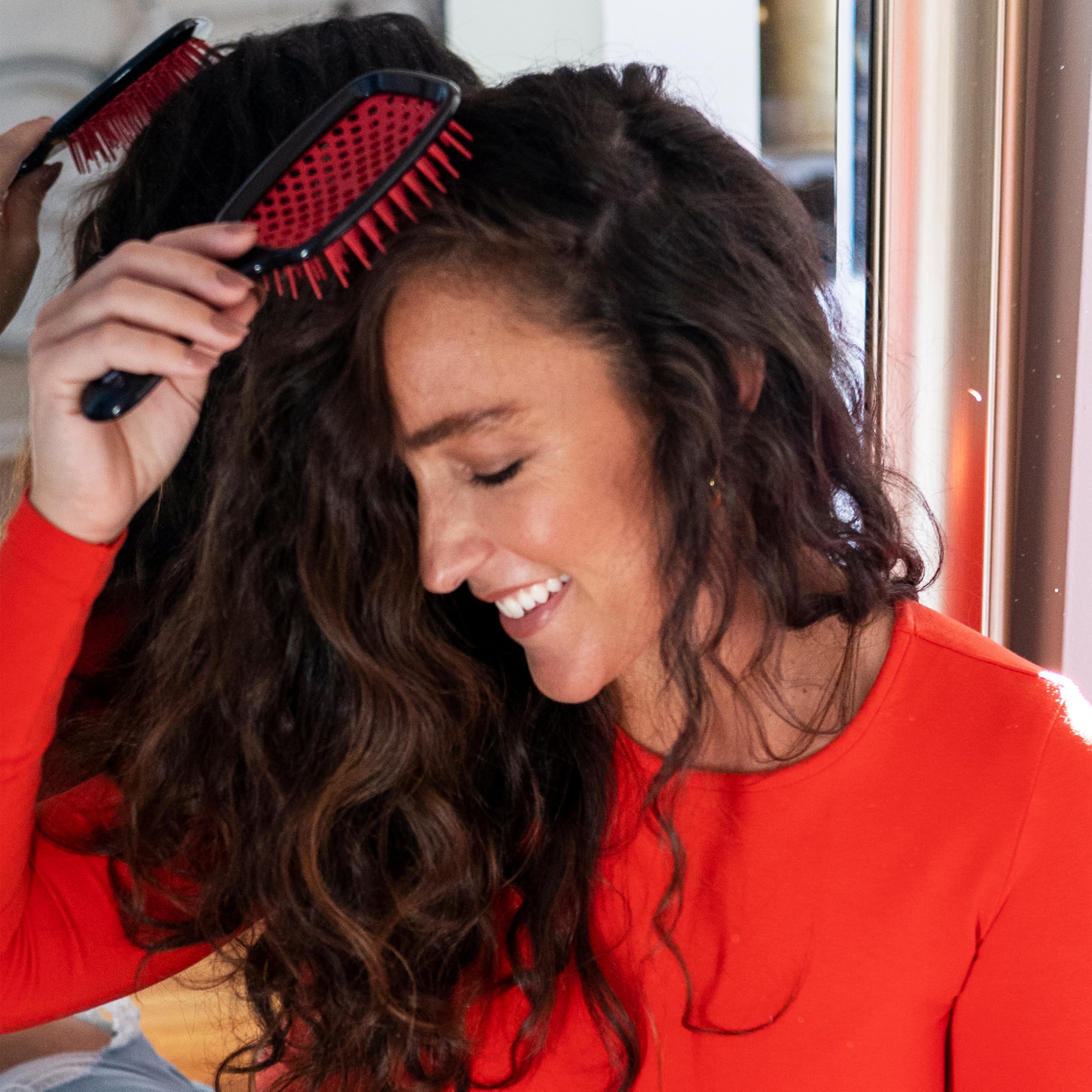 FHI Heat UNbrush Red compact design fits bags for on-the-go styling