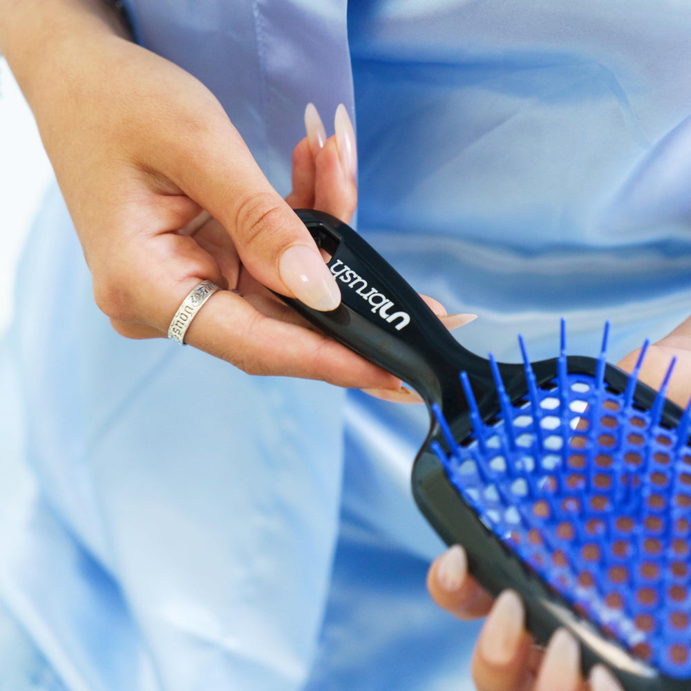 FHI Heat UNbrush travel-friendly packaging photo highlighting compact, easy-to-pack detangler