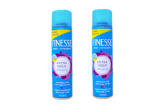 Finesse Extra Hold hairspray bottle close-up showing strong hold and natural finish.
