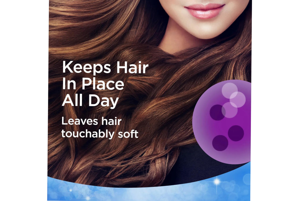 Finesse Extra Hold hairspray spray mist demonstrates even distribution for all-day control.